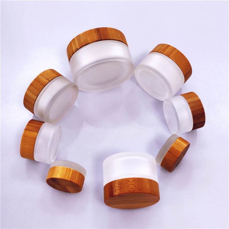 Eco-friendly cosmetic frosted glass jar with wood lid  20ml 30ml 50ml 100ml wooden cap bamboo lid clear glass cream jars