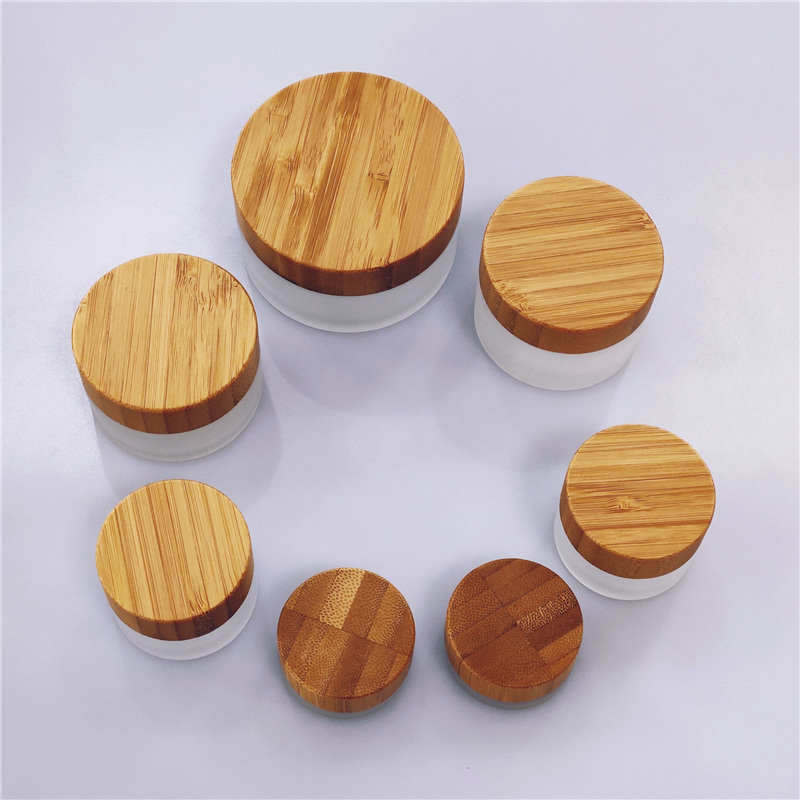 Eco-friendly cosmetic frosted glass jar with wood lid 20ml 30ml 50ml 100ml wooden cap bamboo lid clear glass cream jars
