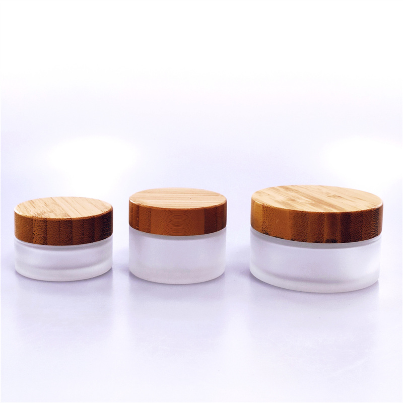 Eco-friendly cosmetic frosted glass jar with wood lid 20ml 30ml 50ml 100ml wooden cap bamboo lid clear glass cream jars