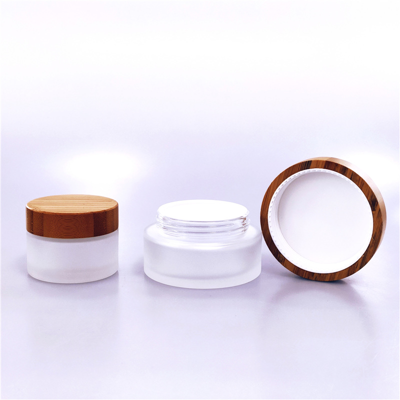 Eco-friendly cosmetic frosted glass jar with wood lid 20ml 30ml 50ml 100ml wooden cap bamboo lid clear glass cream jars