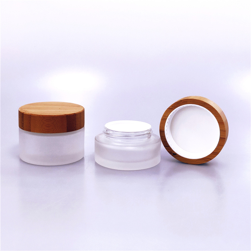 Eco-friendly cosmetic frosted glass jar with wood lid 20ml 30ml 50ml 100ml wooden cap bamboo lid clear glass cream jars