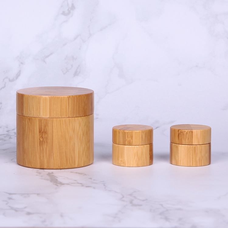 Eco-friendly custom made cosmetic packaging bamboo wooden cream jar, cheap popular durable cylinder empty bamboo pp plastic jar