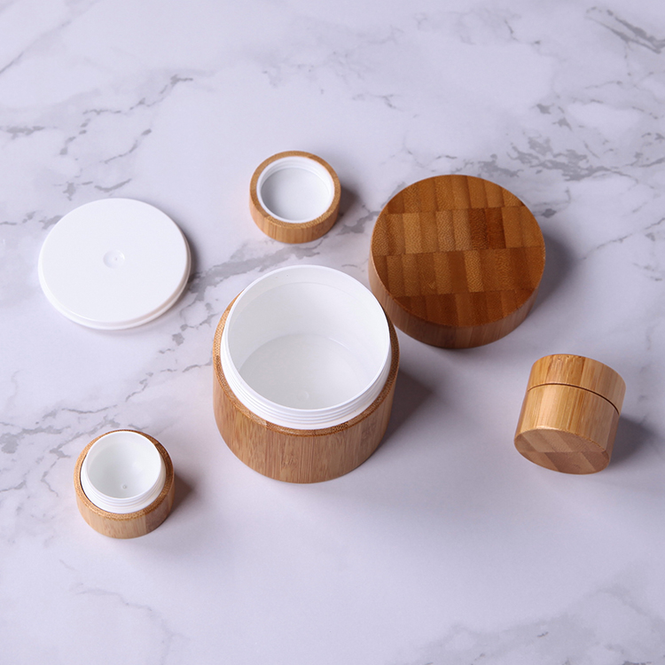 Eco-friendly custom made cosmetic packaging bamboo wooden cream jar, cheap popular durable cylinder empty bamboo pp plastic jar