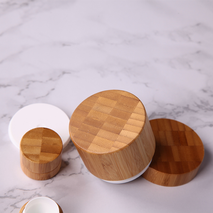 Eco-friendly custom made cosmetic packaging bamboo wooden cream jar, cheap popular durable cylinder empty bamboo pp plastic jar