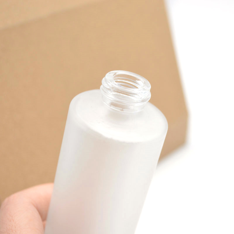Eco friendly frosted glass lotion sprayer bottle with pump spray 50ml 100ml