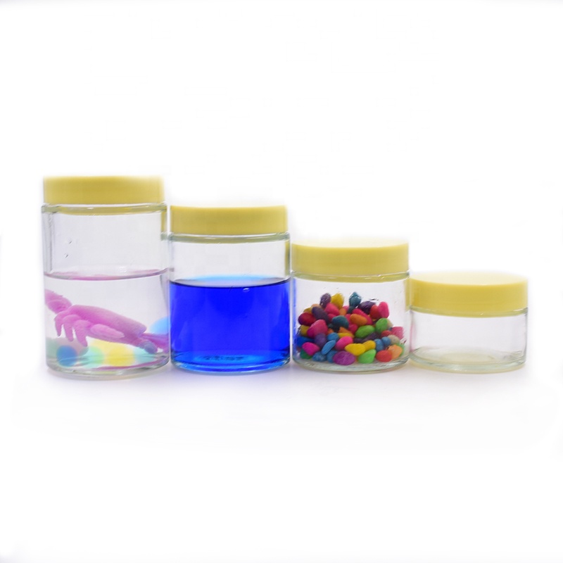 Eco-friendly glass packaging container 100ml 200ml 280ml 380ml food storage sealed glass jar with screw plastic yellow lid