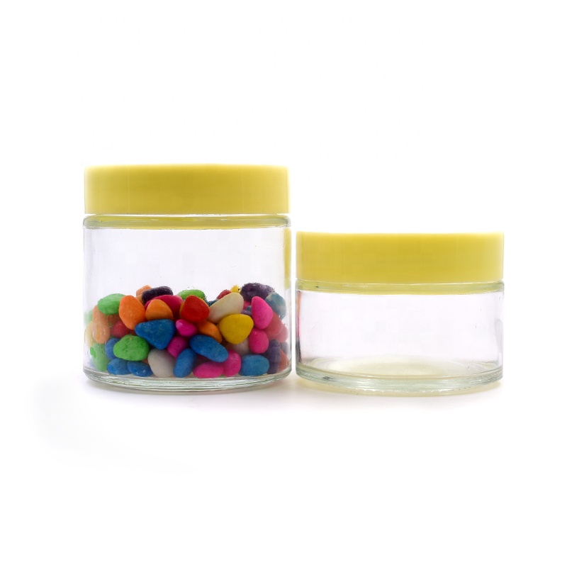 Eco-friendly glass packaging container 100ml 200ml 280ml 380ml food storage sealed glass jar with screw plastic yellow lid