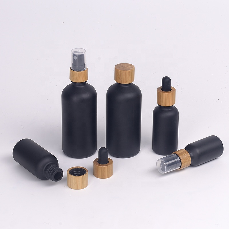Eco-friendly matte black glass 30ml 50ml 60ml essencial oil bottle with bamboo caps