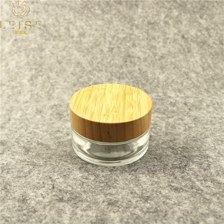 Eco friendly natural bamboo cosmetic jar 50g 50ml clear glass jar with bamboo screw lid 1.7oz cream glass jar with bamboo top