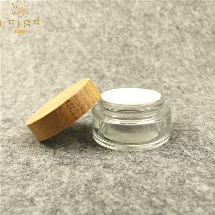 Eco friendly natural bamboo cosmetic jar 50g 50ml clear glass jar with bamboo screw lid 1.7oz cream glass jar with bamboo top