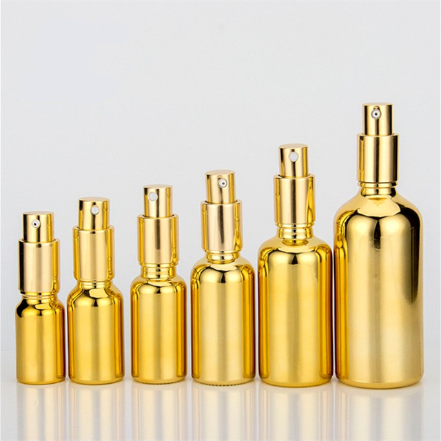 Electroplated gold glass bottle essential oil 20 ml spray bottle with golden Childproof cap