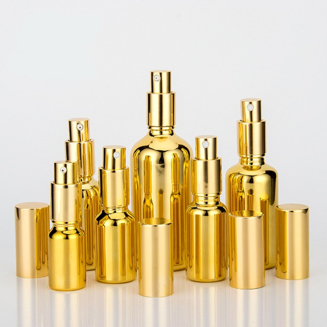 Electroplated gold glass bottle essential oil 20 ml spray bottle with golden Childproof cap