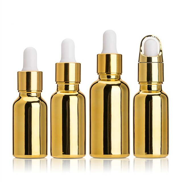 Electroplated gold glass bottle essential oil 20 ml spray bottle with golden Childproof cap