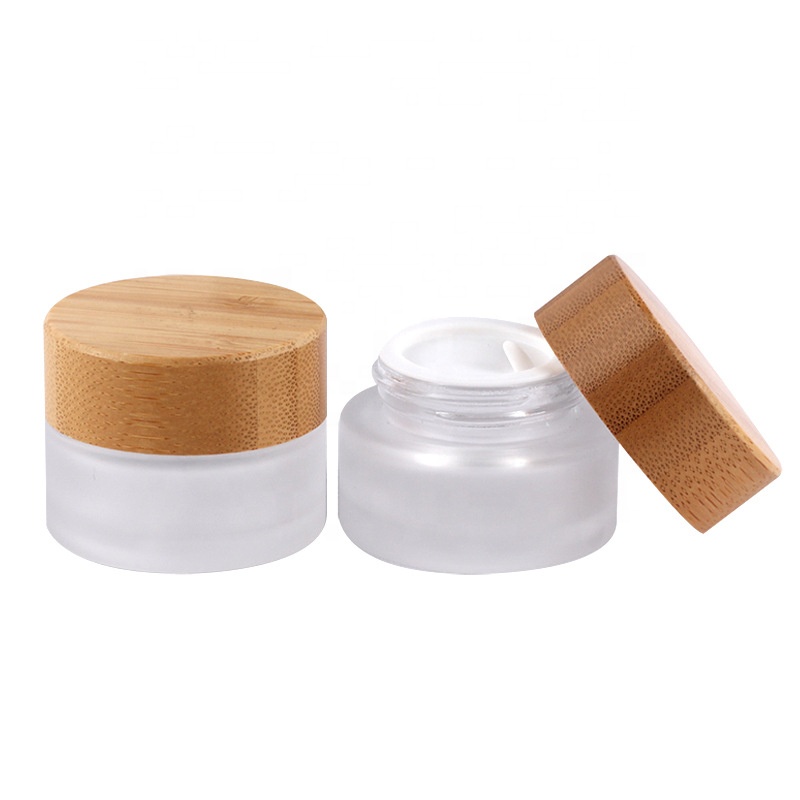 Elegant 30g 50g frosted transparent bulk stock glass cream jar empty container with real bamboo cap