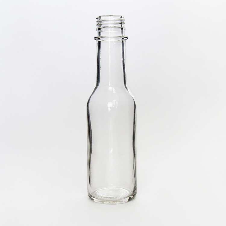 Empty 150ml Clear Glass Hot Sauce Bottle 5 oz Woozy With 28 Opening Tamper Evident Cap Shrink Band