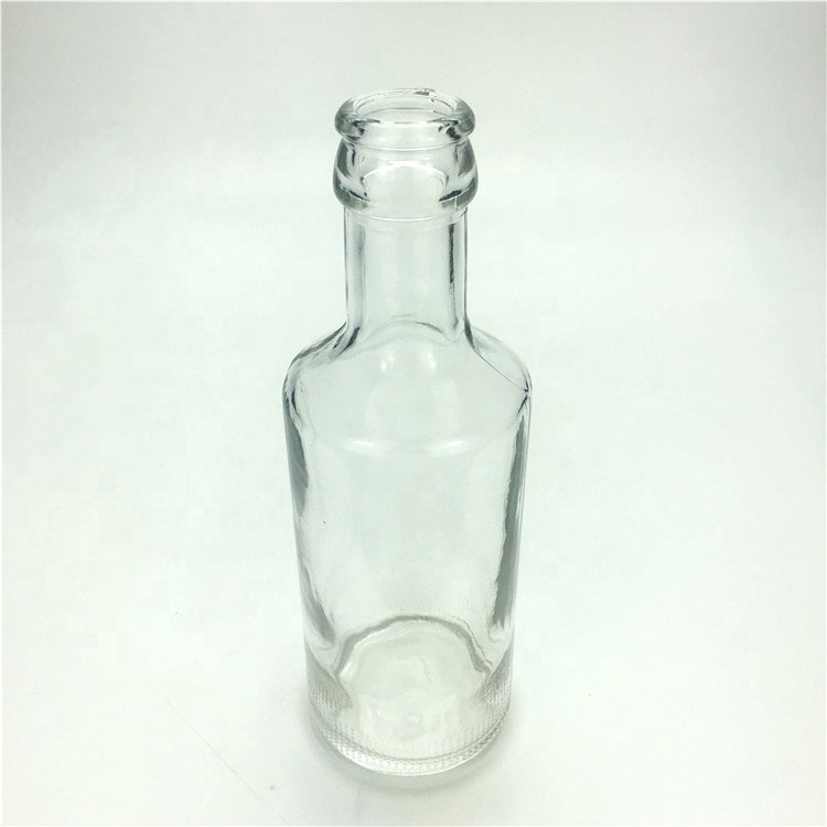 Empty 200ml glass bottles for carbonated drinks with crown cap