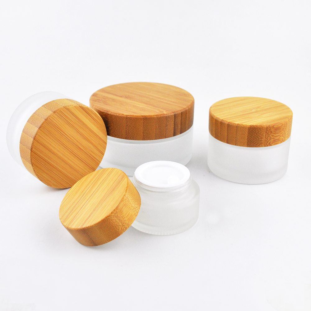 Empty 30ml 50ml 100ml clear frosted glass jars with bamboo wood lid
