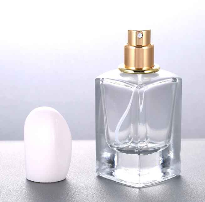 Empty 30ml 50ml Women Clear Square Refillable Glass Bottles with Unique Cap Perfume Mist Spray Atomizers Wholesale