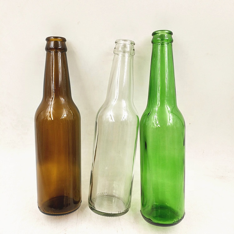 Empty 330ml clear amber green glass beer bottle with 26mm crown cap
