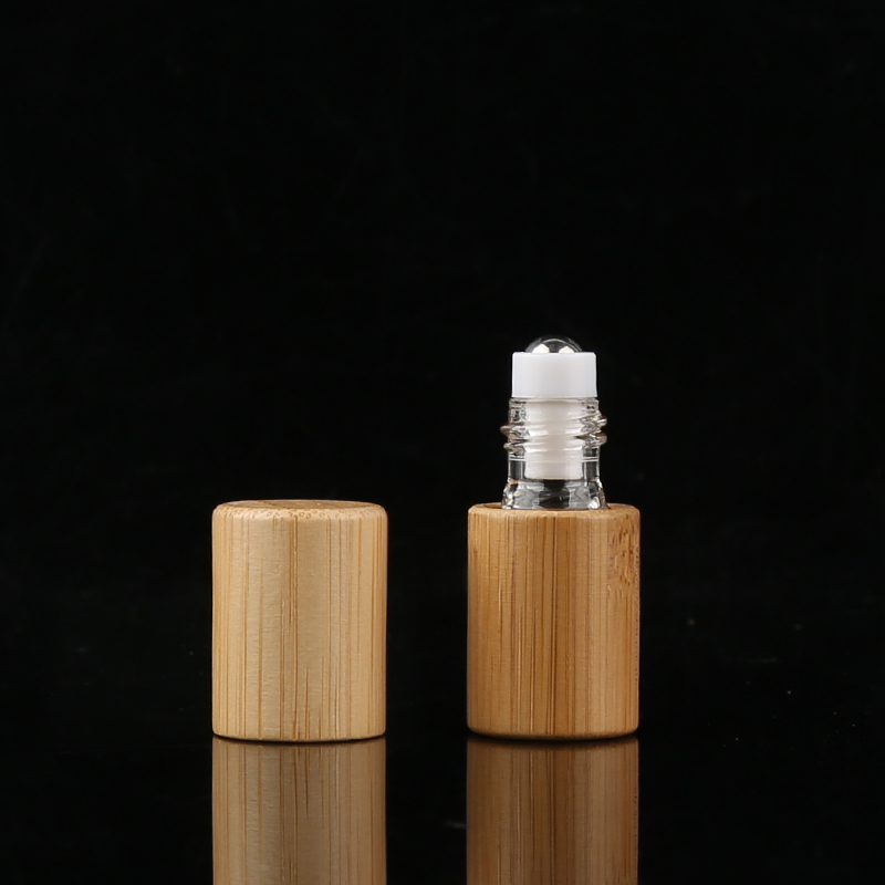 Empty 5 Ml 10 Ml Bamboo Essential Oil Glass Roller Bottle 10 Ml With Stainless Steel Roll On Ball Wholesale