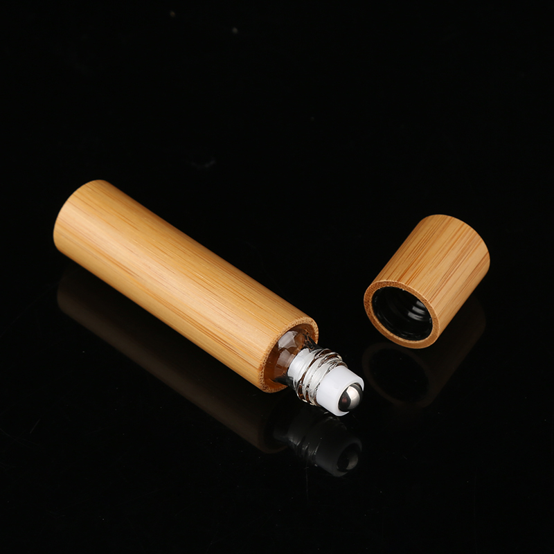Empty 5 Ml 10 Ml Bamboo Essential Oil Glass Roller Bottle 10 Ml With Stainless Steel Roll On Ball Wholesale