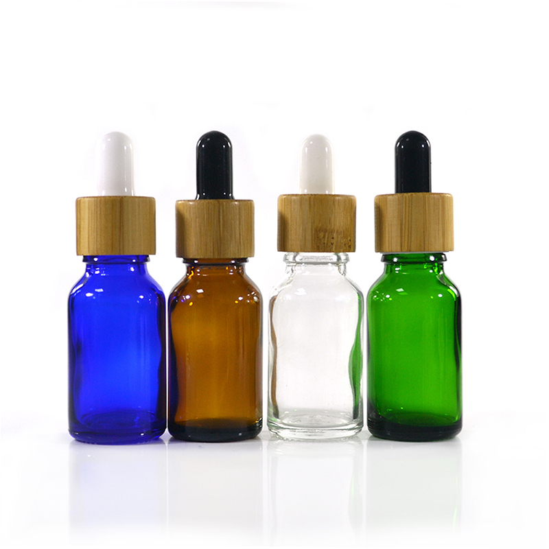 Empty 5ml 10ml 15ml 20ml 30ml 50ml 100ml natuaral black amber clear green essence oil glass dropper bottle with bamboo lid