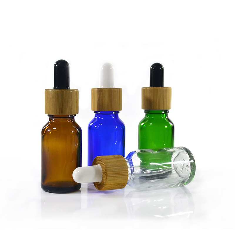 Empty 5ml 10ml 15ml 20ml 30ml 50ml 100ml natuaral black amber clear green essence oil glass dropper bottle with bamboo lid