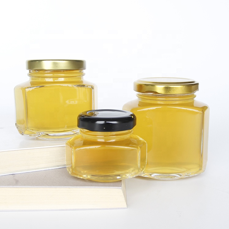 Empty Clear 45ml 106ml 180ml Oval Hexagon Glass Honey Jam Jar With Gold Cap For Storage