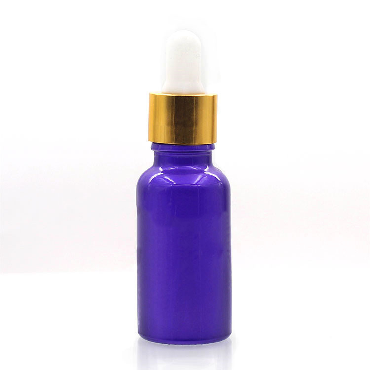 Empty Essential Oil Bottles In Purple Painting With Plastic Childproof Cap