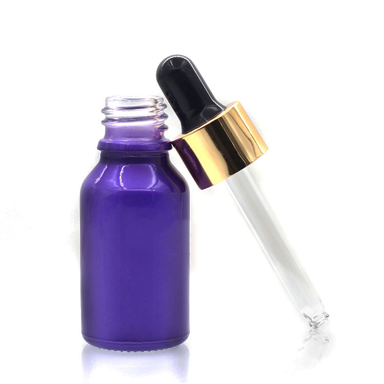 Empty Essential Oil Bottles In Purple Painting With Plastic Childproof Cap