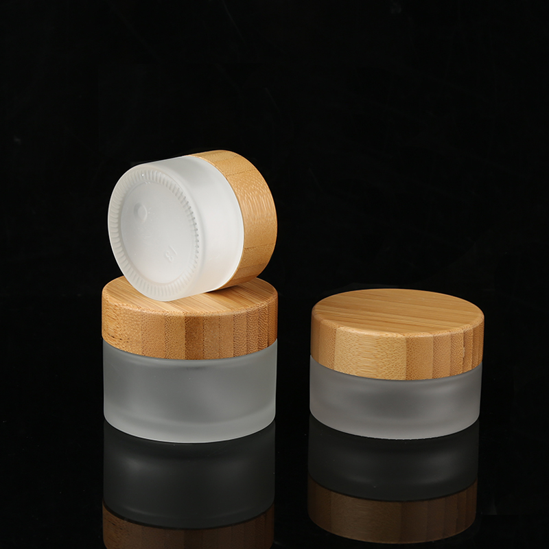 Empty Refillable Frosted Glass CBD Jars With Bamboo Safety Lids For Hemp Cream CBD Oil