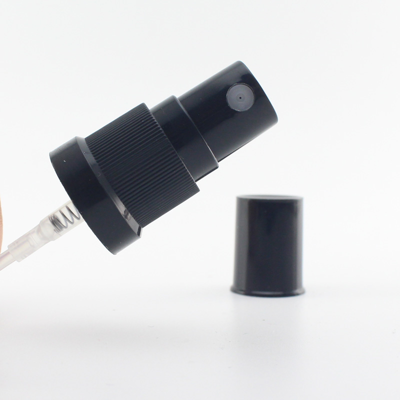 Empty amber glass spray bottle with fine mist sprayer for essential oils
