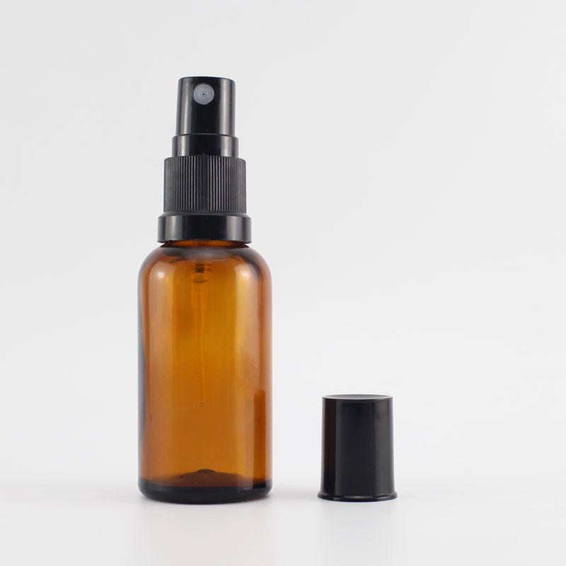 Empty amber glass spray bottle with fine mist sprayer for essential oils