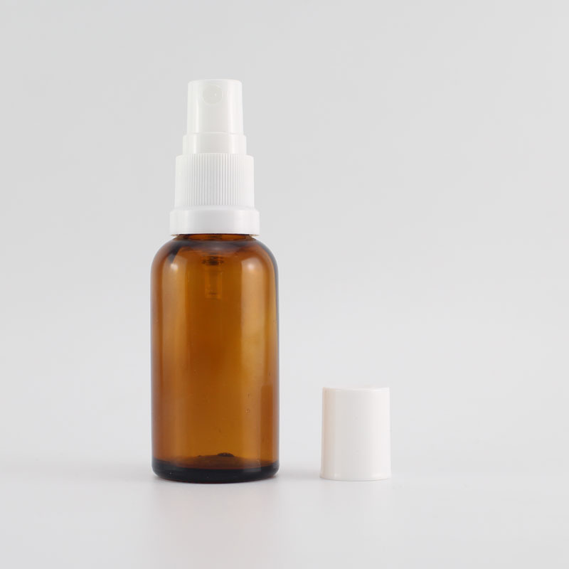 Empty amber glass spray bottle with fine mist sprayer for essential oils