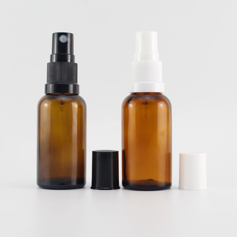 Empty amber glass spray bottle with fine mist sprayer for essential oils