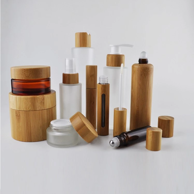 Empty bamboo cosmetic packaging glass cosmetic jars and bottles with bamboo lids wholesale