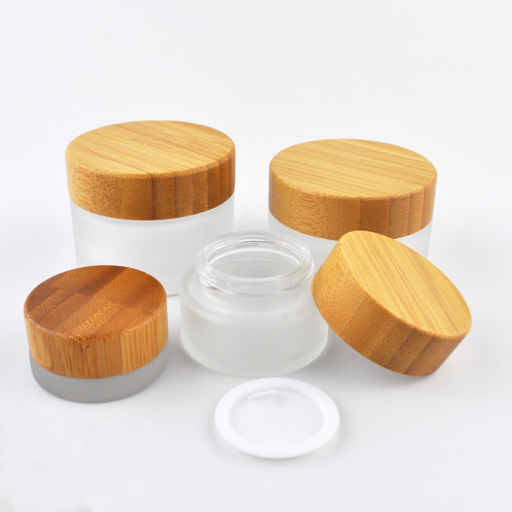 Empty bamboo cosmetic packaging glass cosmetic jars and bottles with bamboo lids wholesale