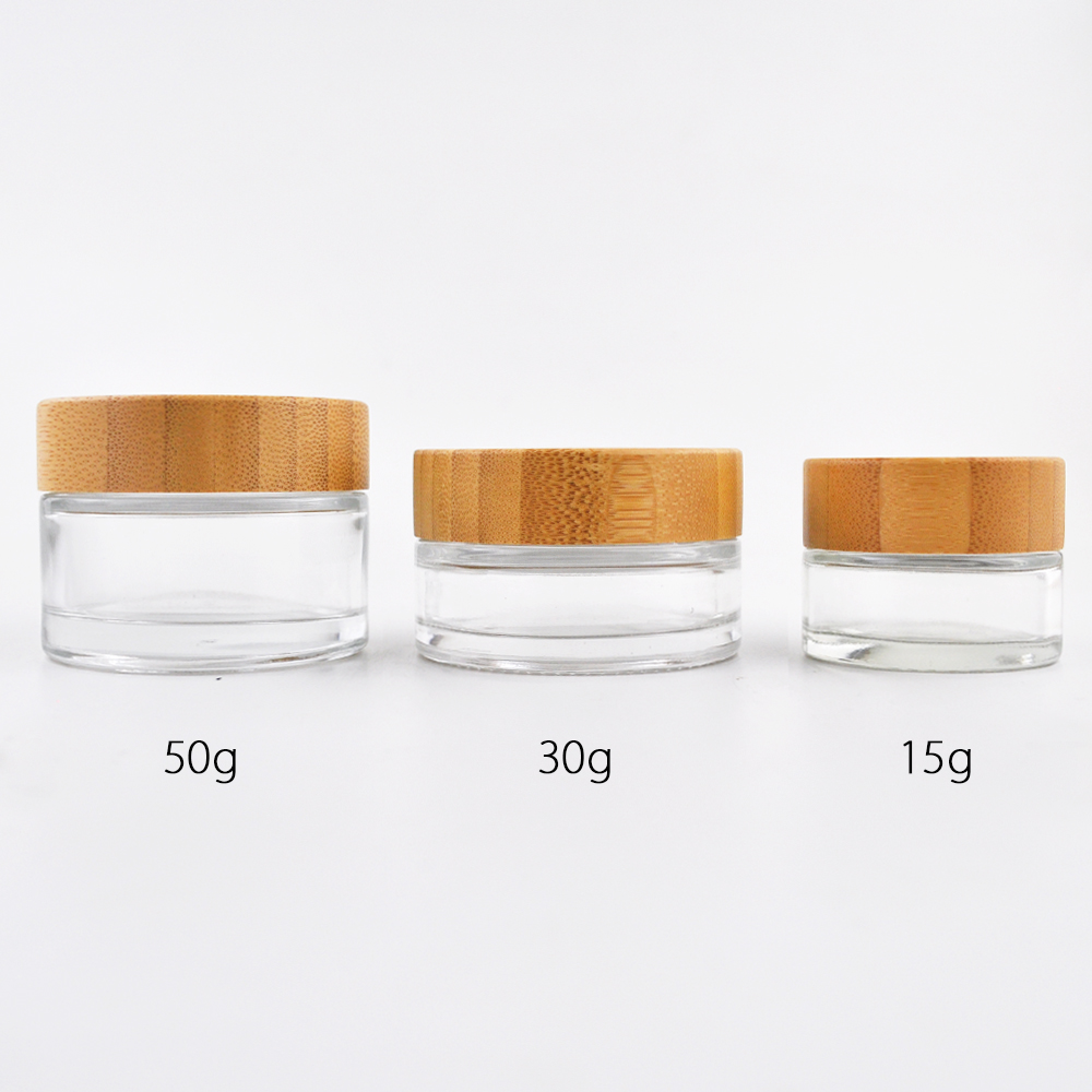 Empty bamboo cosmetic packaging glass cosmetic jars and bottles with bamboo lids wholesale