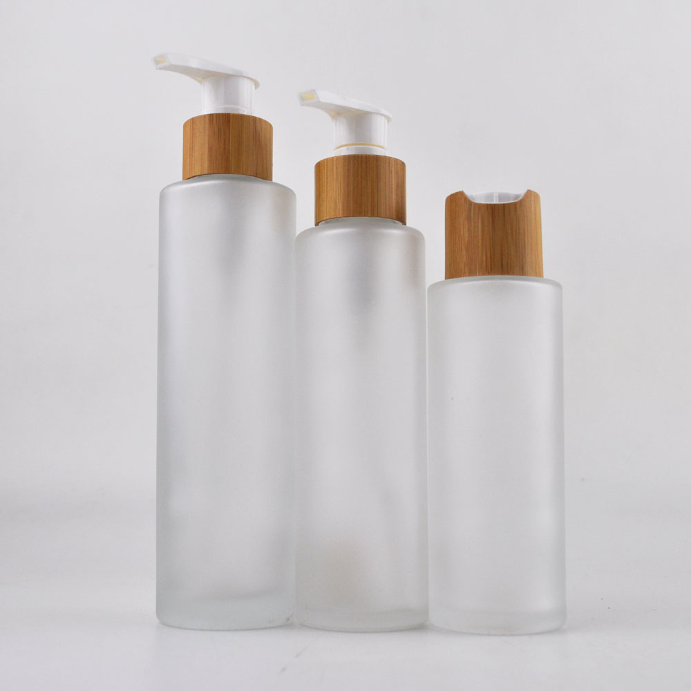 Empty bamboo cosmetic packaging glass cosmetic jars and bottles with bamboo lids wholesale