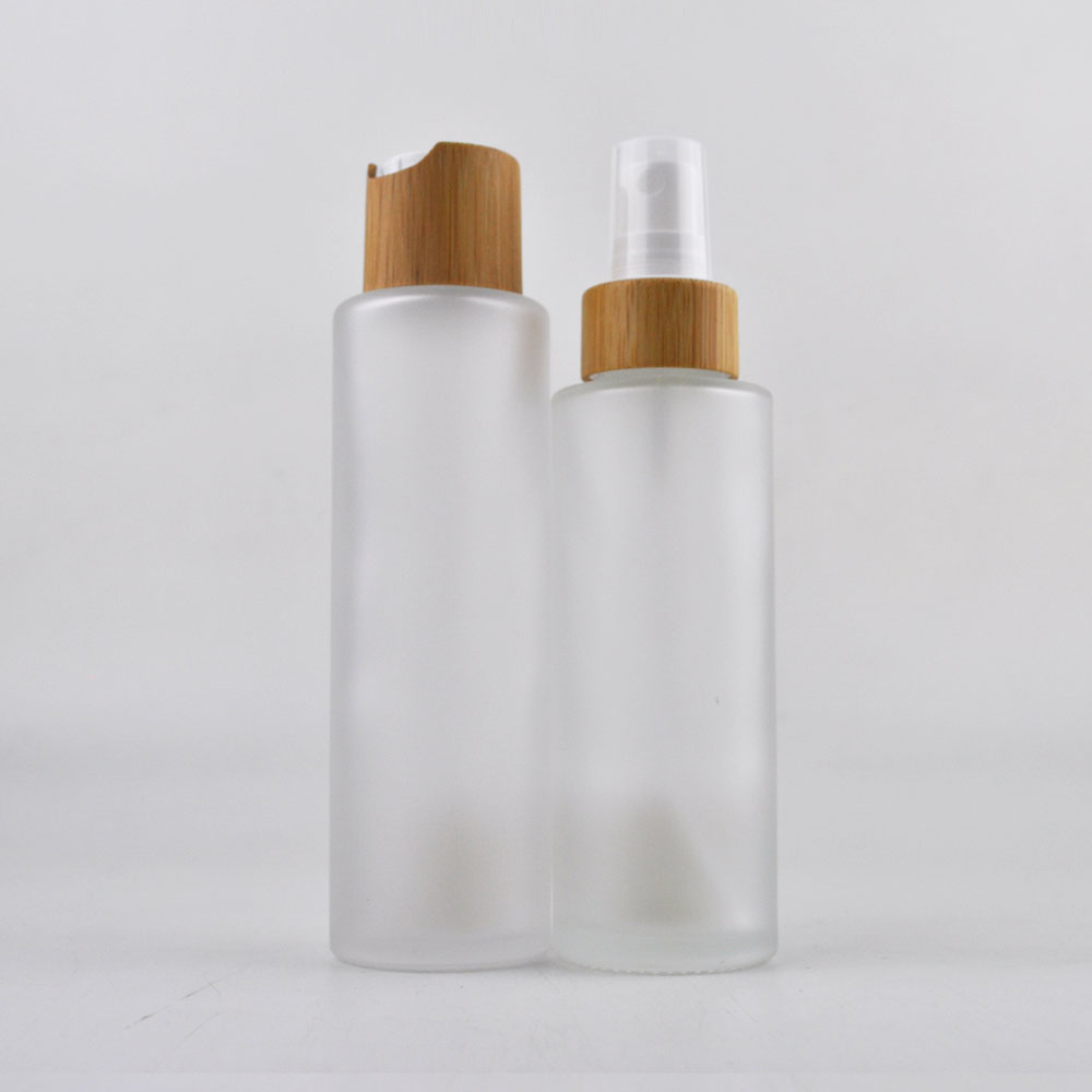 Empty bamboo cosmetic packaging glass cosmetic jars and bottles with bamboo lids wholesale