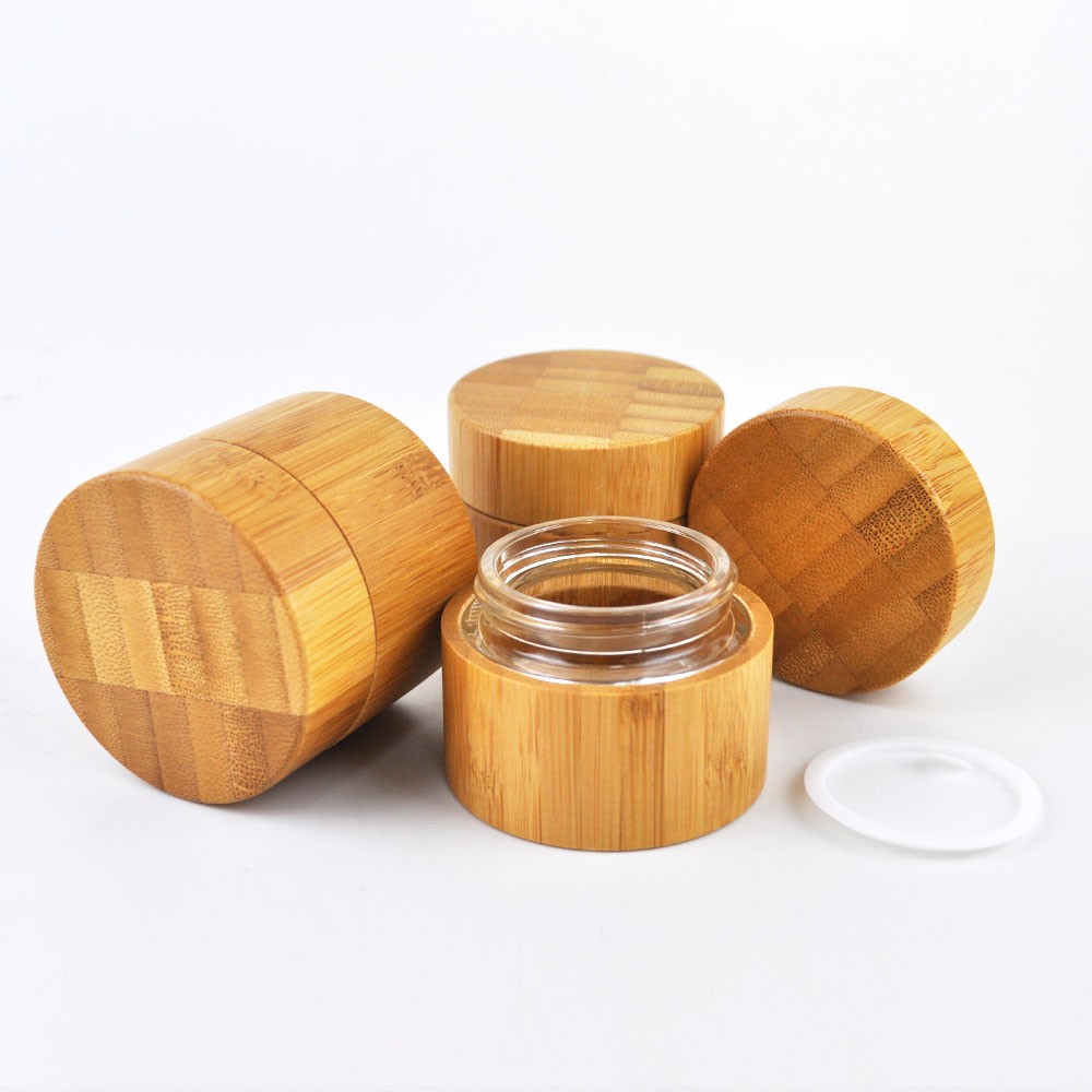 Empty bamboo cosmetic packaging glass cosmetic jars and bottles with bamboo lids wholesale