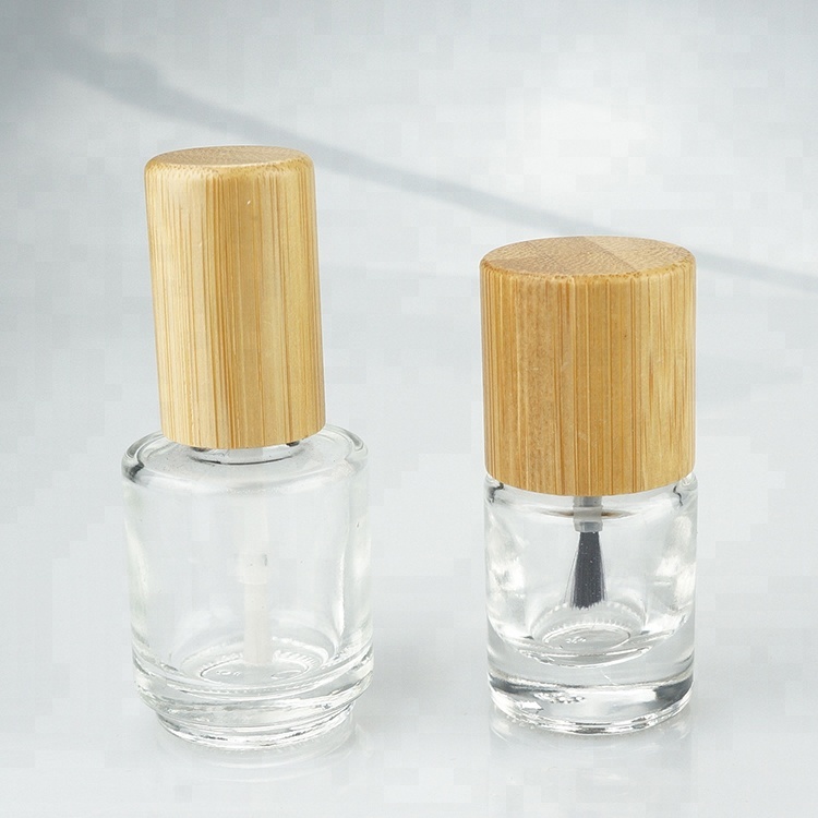 Empty clear custom made nail polish glass bottle unique design wholesale with flat brush and long wood nail polish round cap