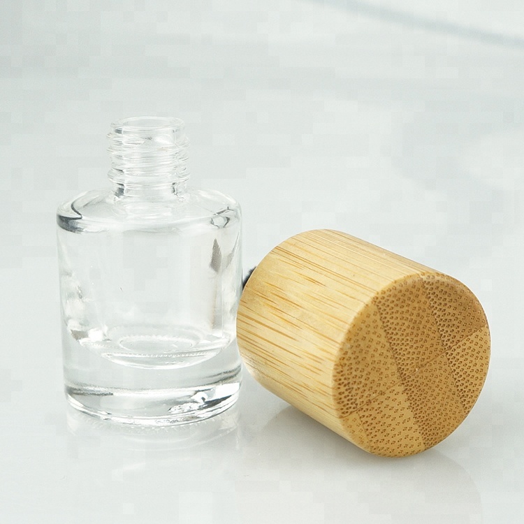 Empty clear custom made nail polish glass bottle unique design wholesale with flat brush and long wood nail polish round cap