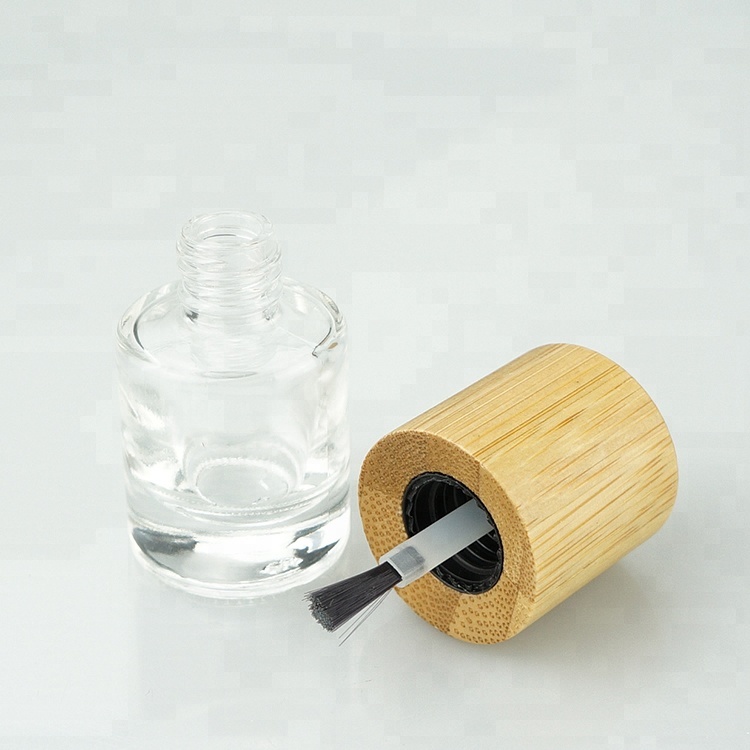 Empty clear custom made nail polish glass bottle unique design wholesale with flat brush and long wood nail polish round cap