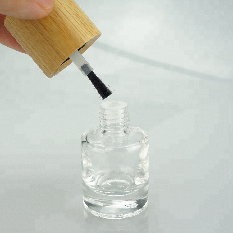 Empty clear custom made nail polish glass bottle unique design wholesale with flat brush and long wood nail polish round cap