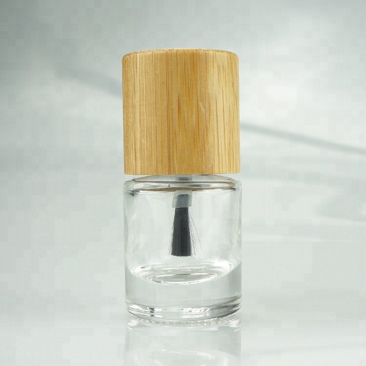 Empty clear custom made nail polish glass bottle unique design wholesale with flat brush and long wood nail polish round cap