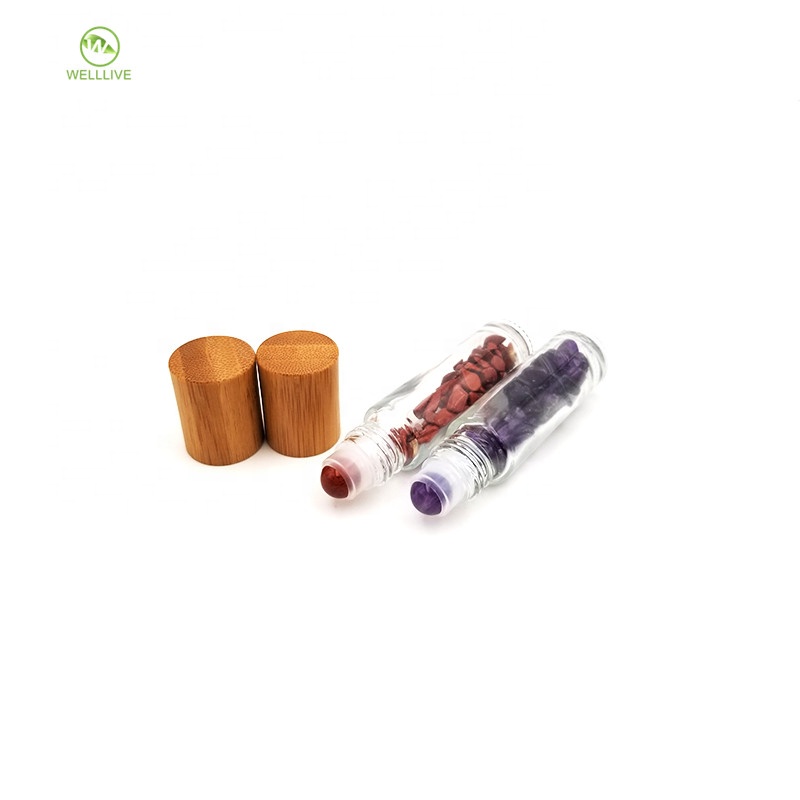 Empty cosmetic attar essential oil packaging 10ml clear glass gemstone roller bottles with bamboo lid