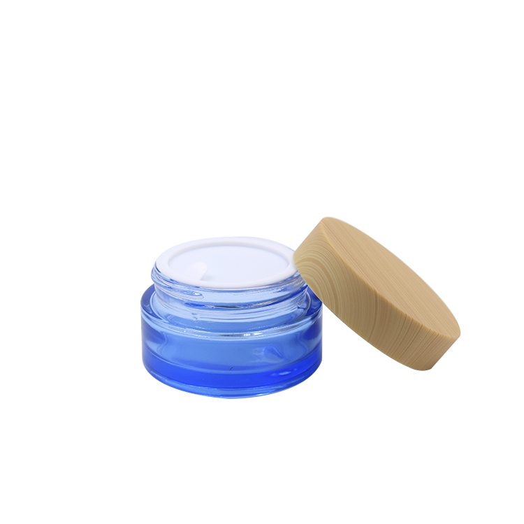 Empty cosmetic packaging 20g 30g 50g factory price high quality flat shoulder clear blue round glass jar with plastic lid