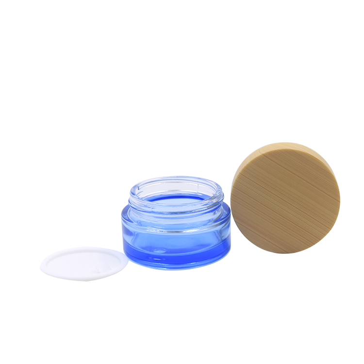 Empty cosmetic packaging 20g 30g 50g factory price high quality flat shoulder clear blue round glass jar with plastic lid
