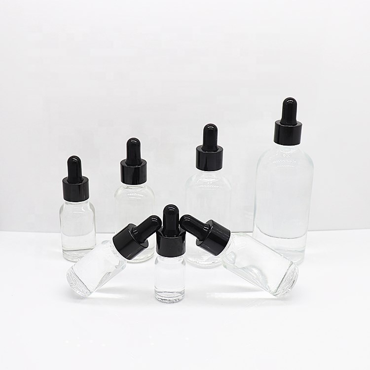 Empty essential oil bottle with round paper box amber glass bottle glass bottle with dropper cap wholesale 5-100ml